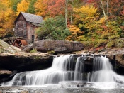 Old Lumber Mill by a Waterfall Wallpaper